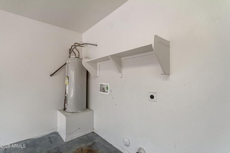 Laundry Area with Storage Shelf