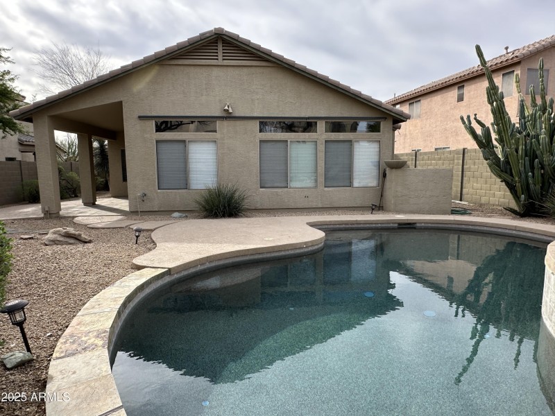 Pool and house