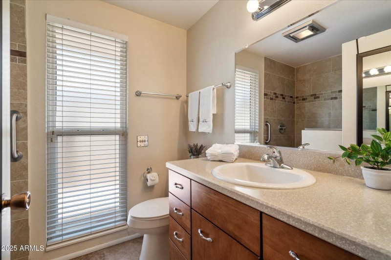 Updated primary shower & bathroom