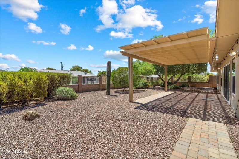 Spacious low maintenance patio & yard