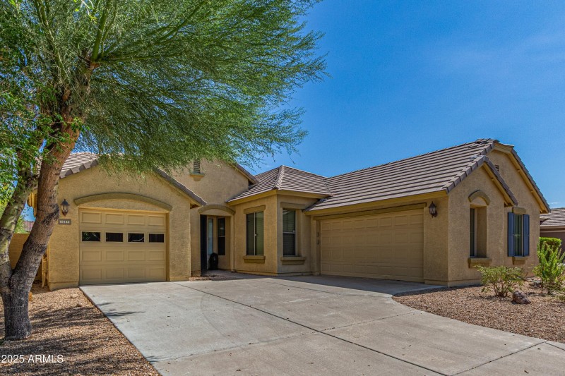With coveted 2-car plus 1-car garage