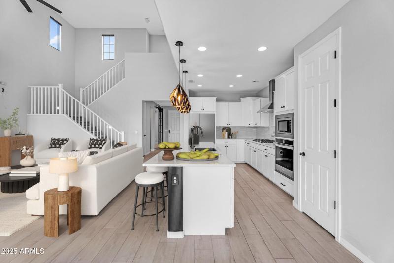 006_living_room_couch_bar_stools_1_575