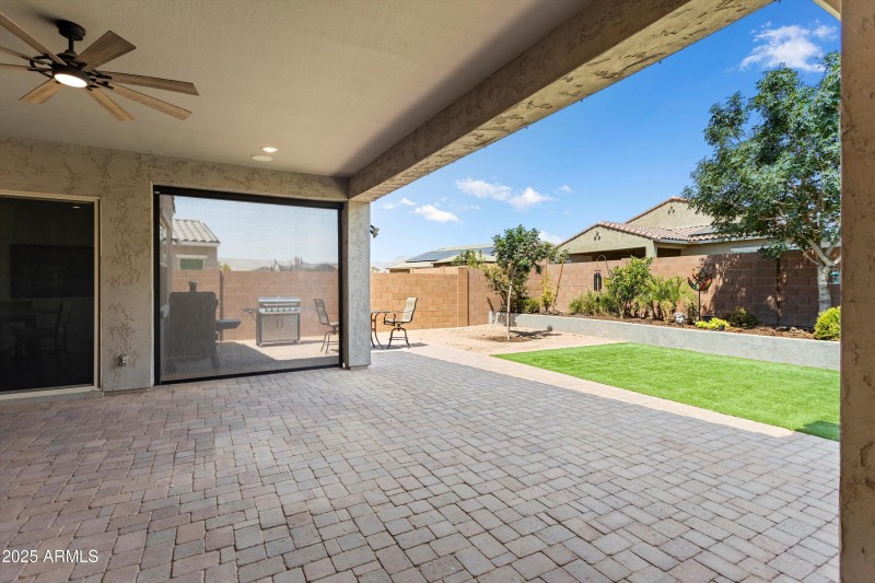 Roller Shade at Rear Patio - down