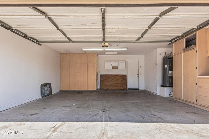 garage with cabinets