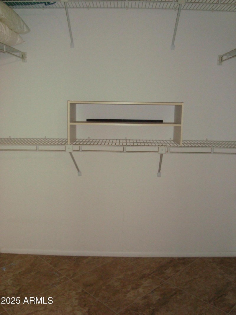 MASTER WALK IN CLOSET
