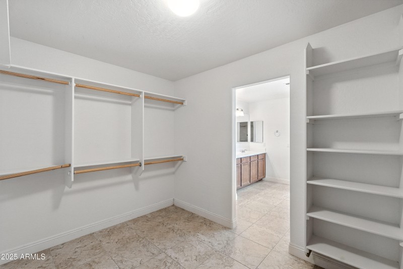 Primary Bedroom Walk-in Closet