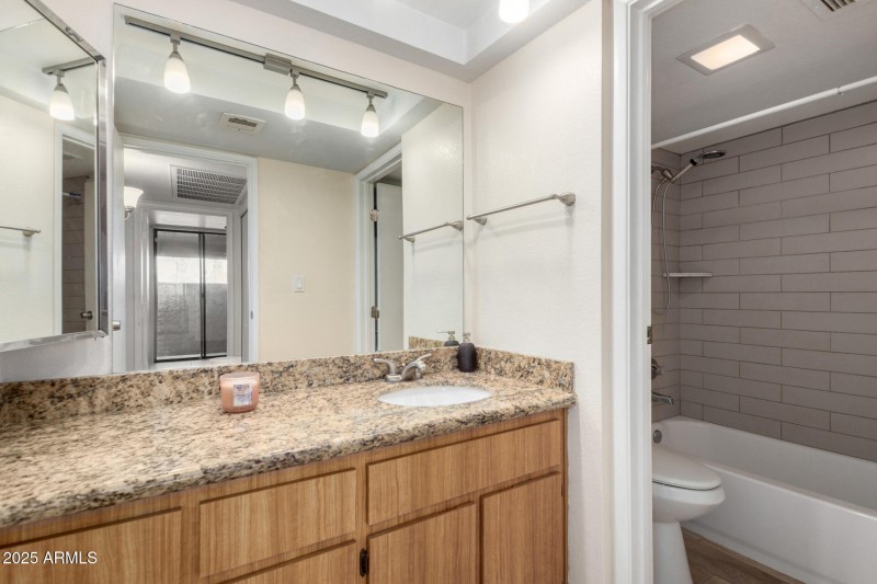 Sink/Toilet separated by a door