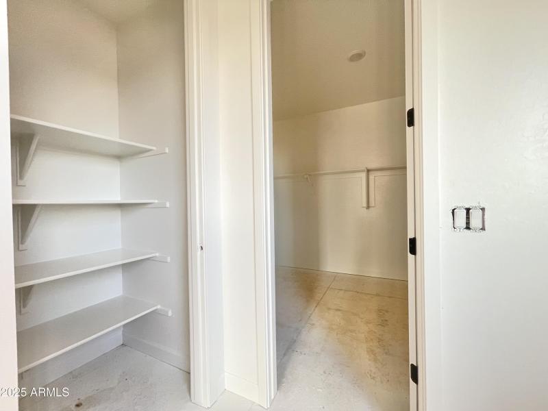 26 Linen and primary closet