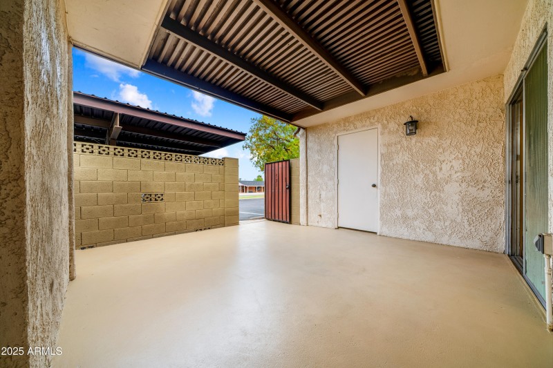 Covered Back Patio Facing Laundry Room