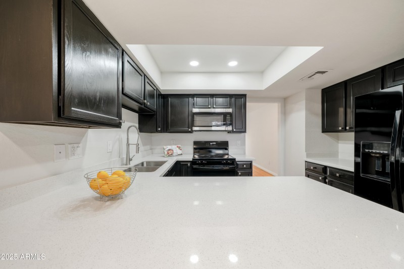 Kitchen Has Quartz Counter Tops