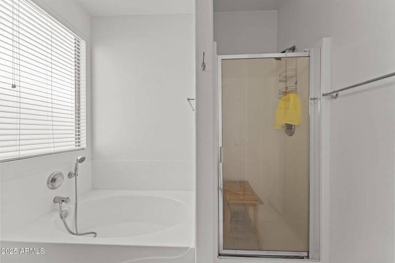 tub and shower in primary
