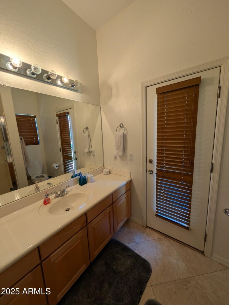 Bathroom in bedroom 4 leading outside