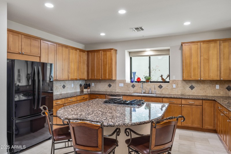 Custom cabinetry/large granite island