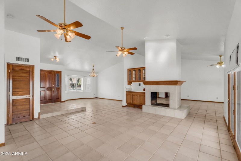 Living Room with Fireplace and Wet Bar