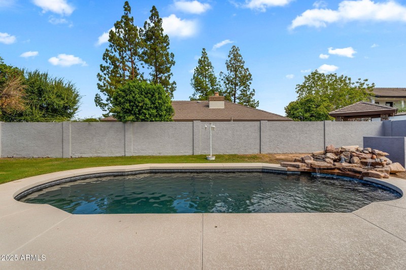 Resort-Style Pool with Water Feature