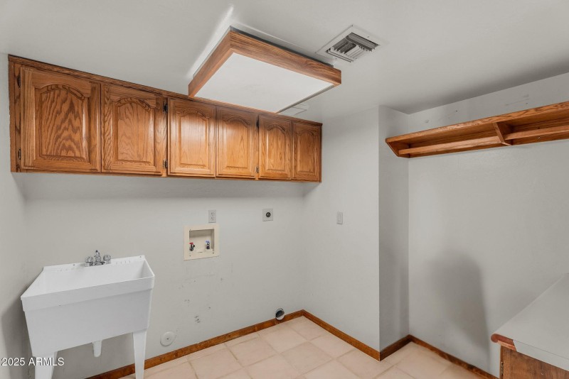 Spacious Laundry Room with Utility Sink