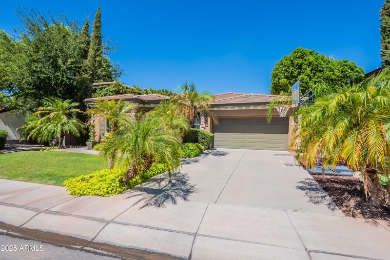 Front with Garage and Driveway