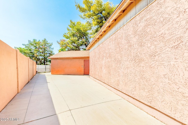 Side of garage/generous storage areas