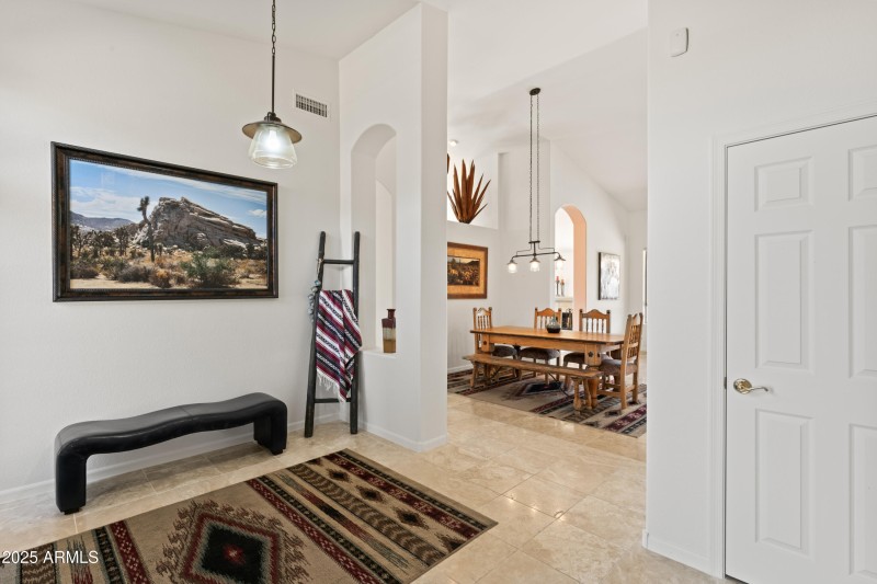 FOYER LEADING INTO LIVING & DINING AREA