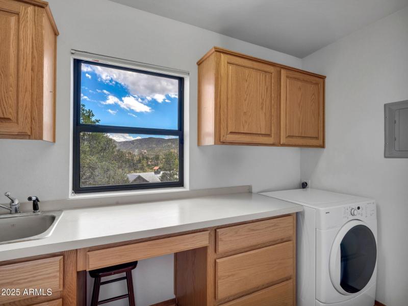 Laundry Room with Cabinets and Countersp