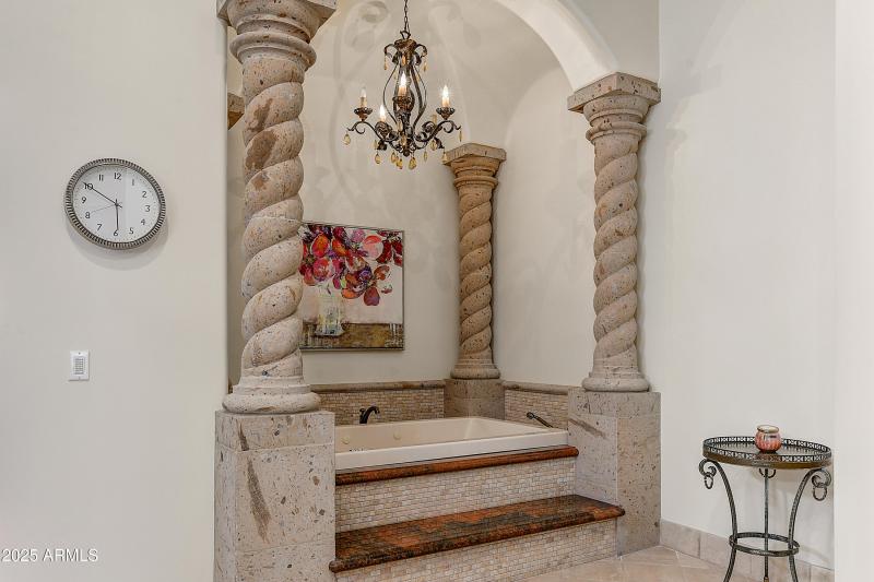 Elegant Tub with Pillared Alcove