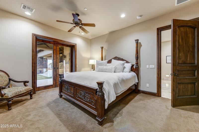 Fifth Bedroom with Patio Access