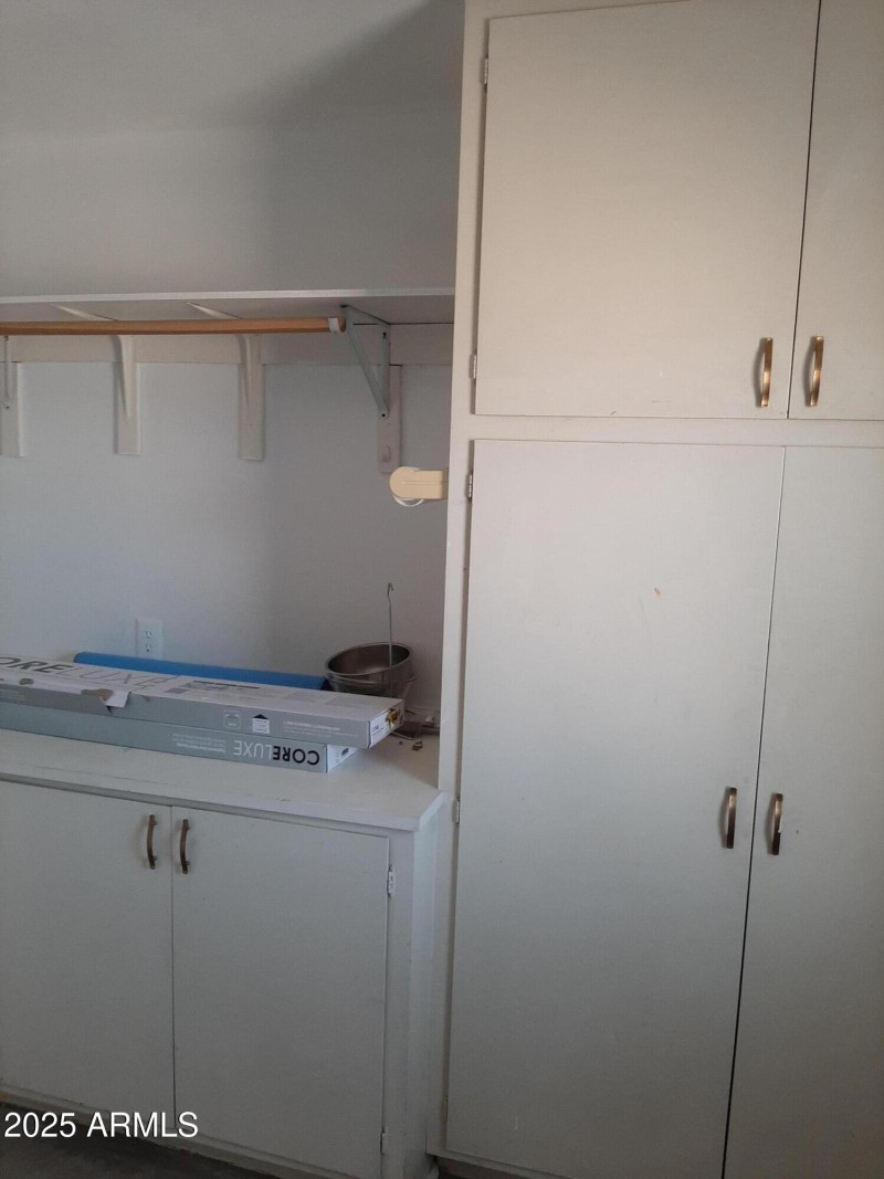 Cabinets in Garage and Laundry area