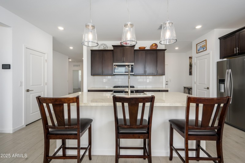Granite Countertops & Pendant Lighting!