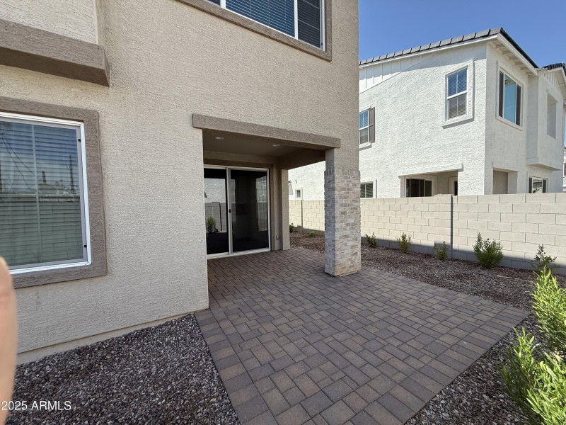 Extended brick paver patio