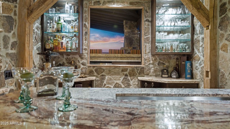 BAR WINDOW OPENS TO OUTDOOR BAR