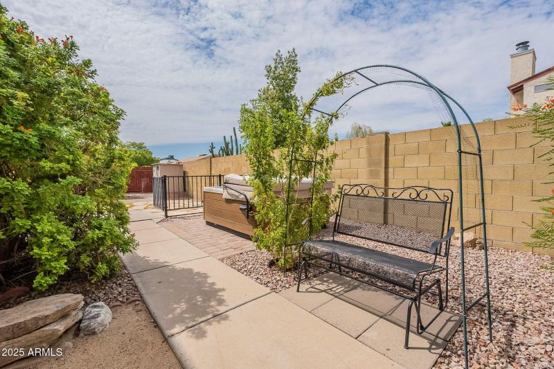 Side yard inside front gate.