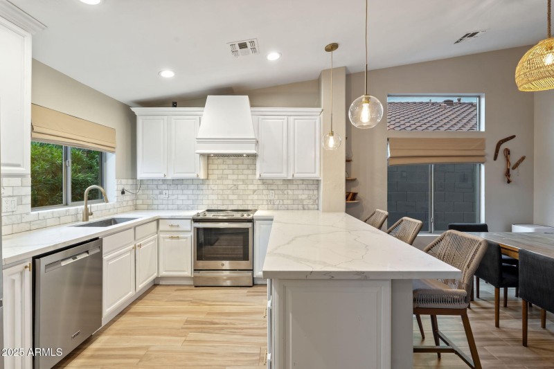 Quartz Counters w/ Marble Backsplash