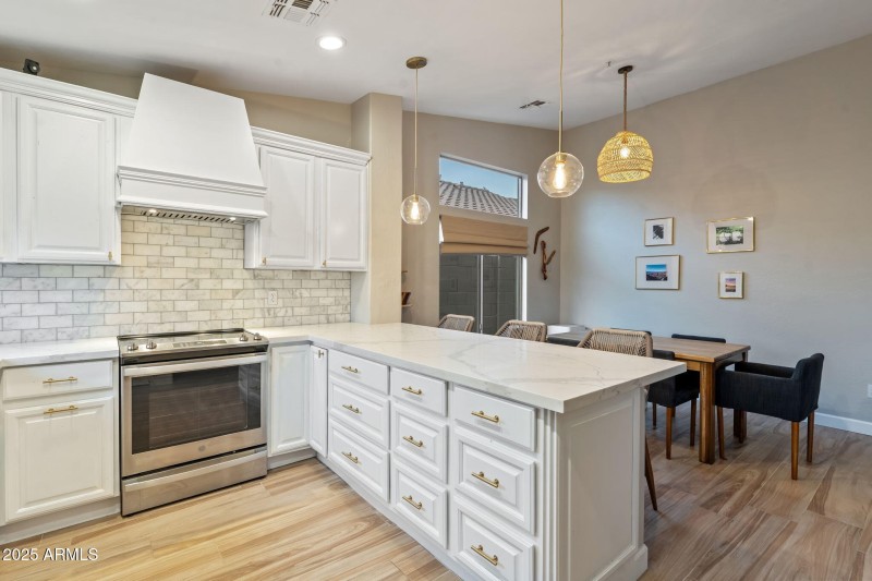 Kitchen w/ Custom Hood