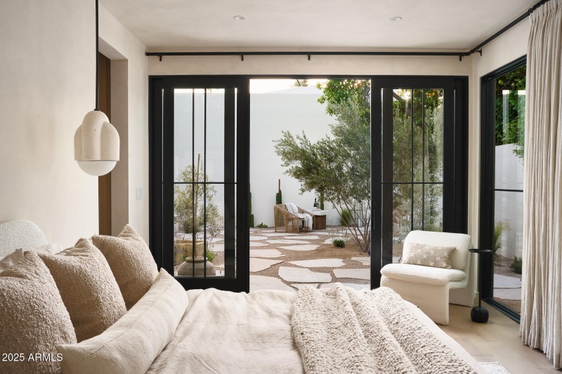 Owner's Suite to the Charming Backyard