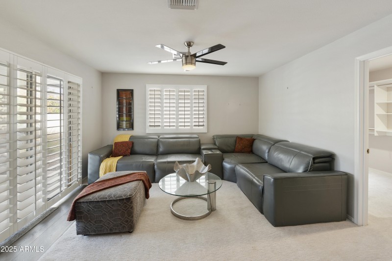 Primary suite sitting w/patio access