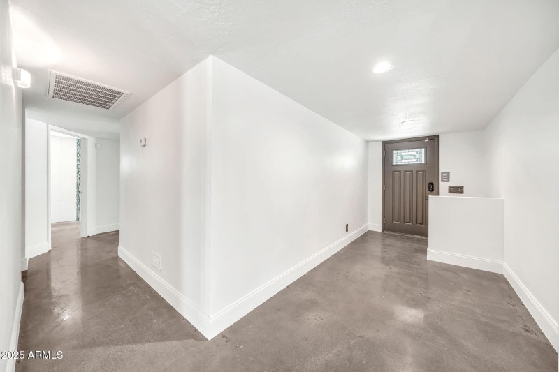 Front Entry Way & Hallway To Bedrooms