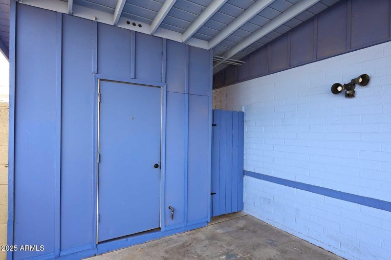 Storage shed off of driveway