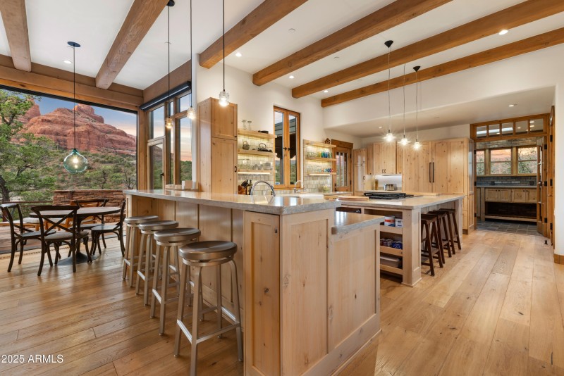 Flows into Kitchen