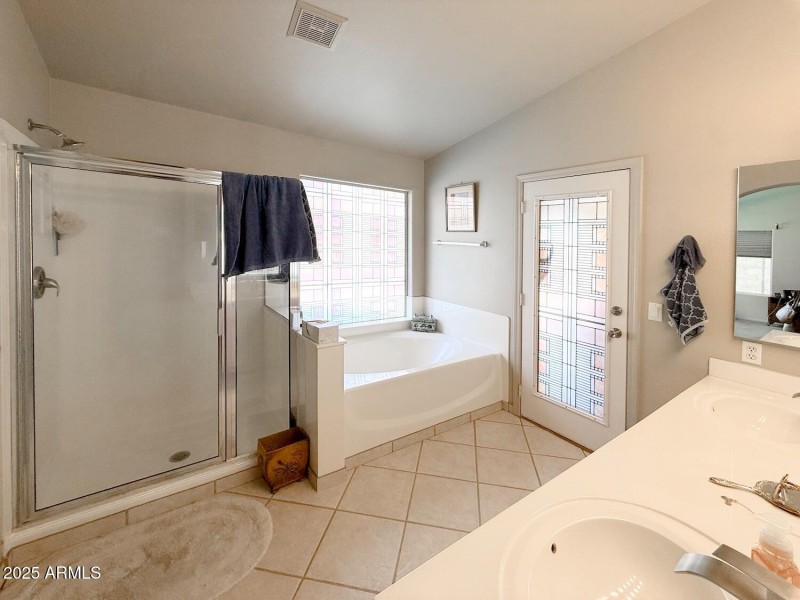 Master bath with door to outside patio!
