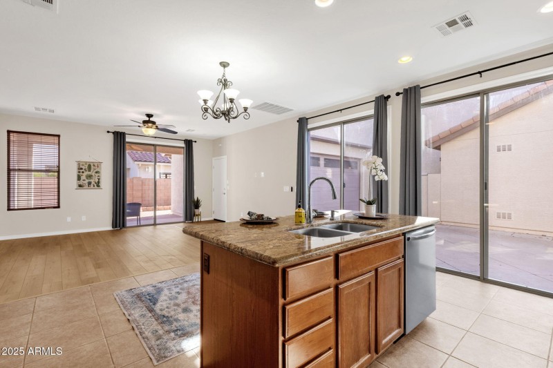 Island opens to family room, back patio
