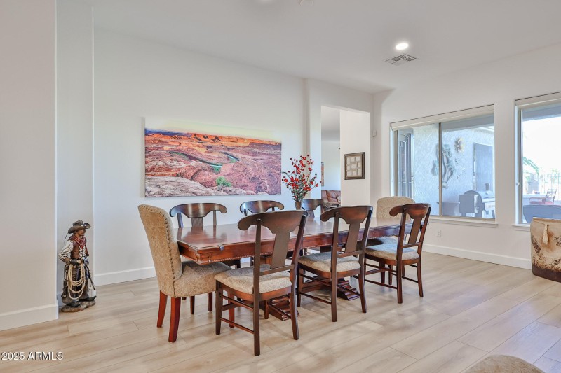 Dining looks out to patio & golf