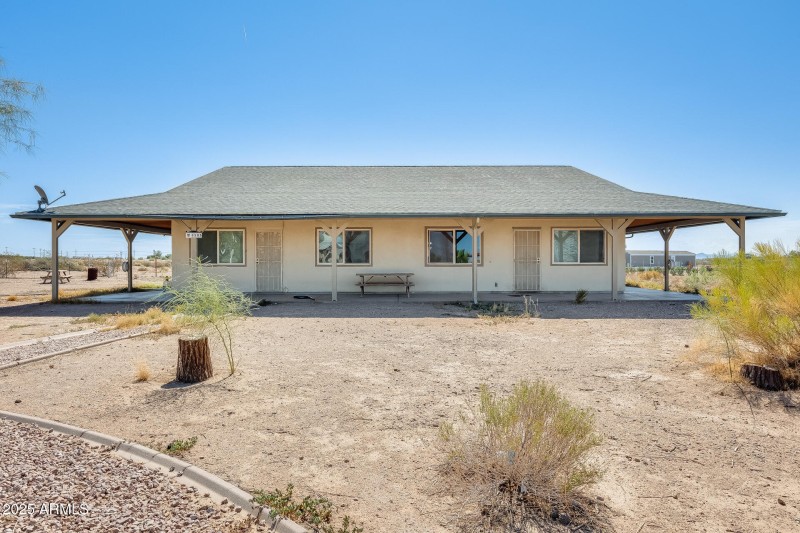 Finished house on left, unfinished on ri