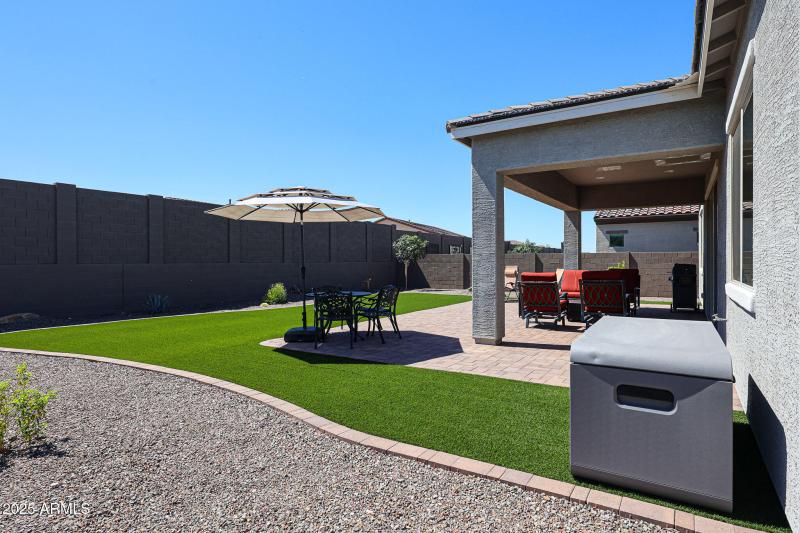 synthetic grass/ pavers
