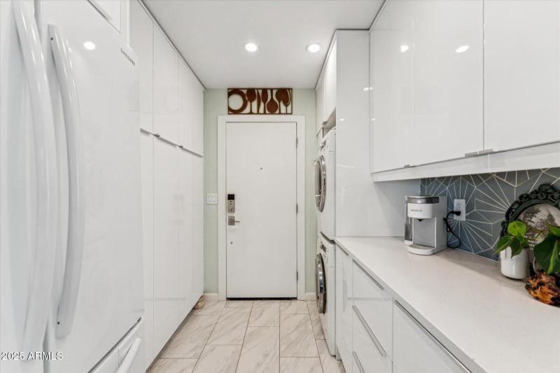 Laundry w/ Storage and Counter Space