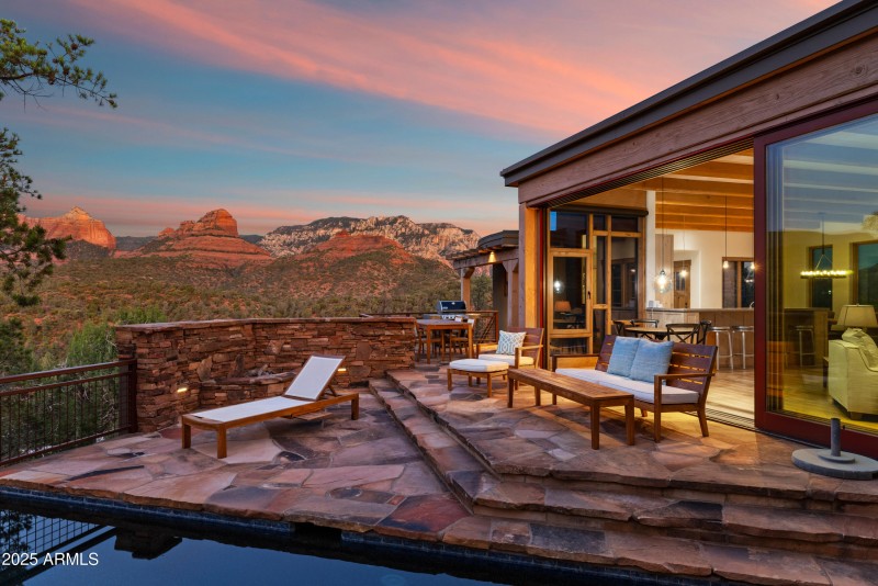 Opens onto backyard oasis
