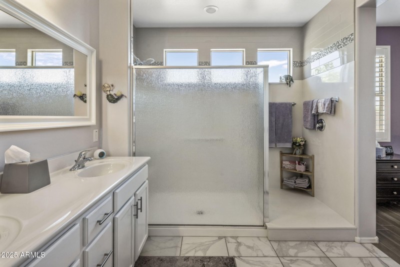 Oversized primary shower