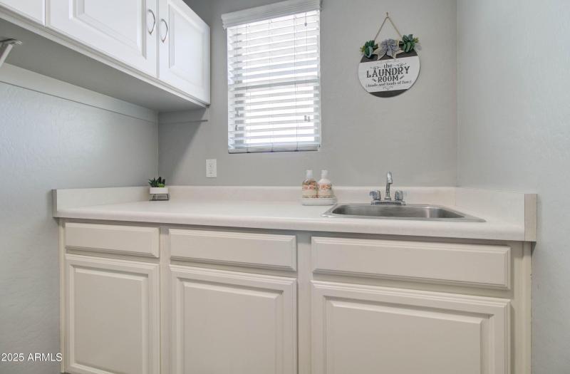 Laundry Room Sink and Cupboard