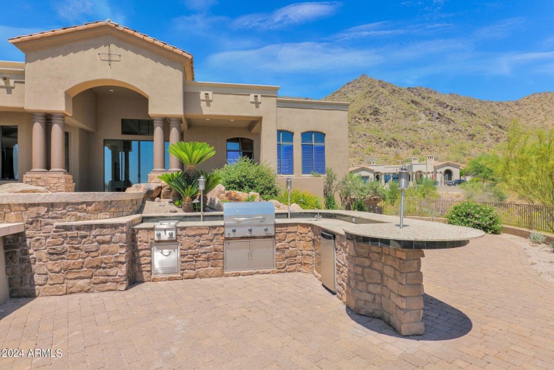 Outdoor kitchen & lower patio