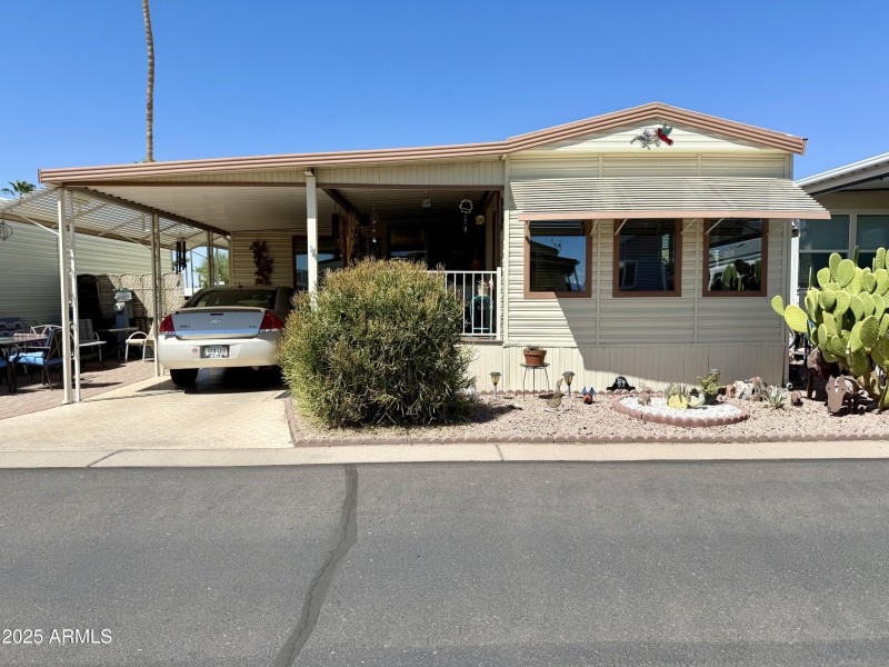7750 E. BROADWAY RD. #123