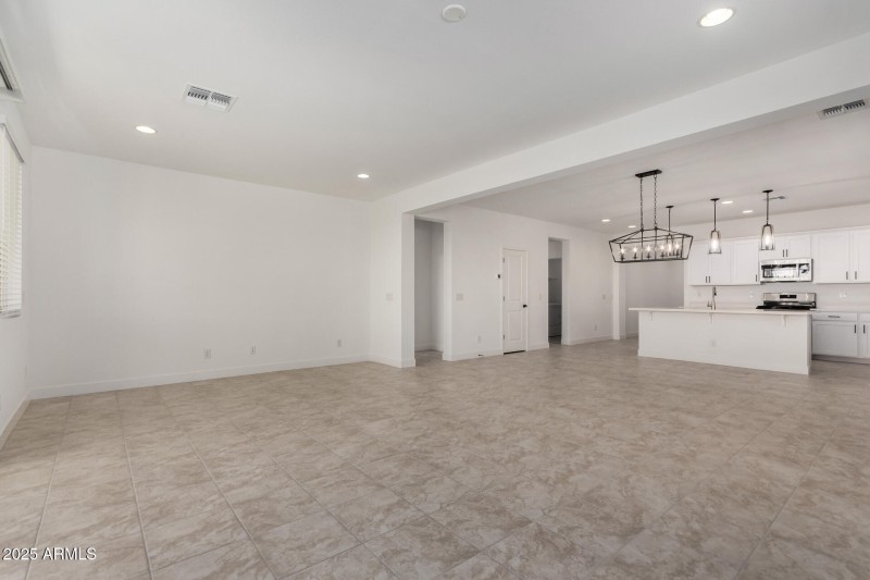 Living area and view of kitchen